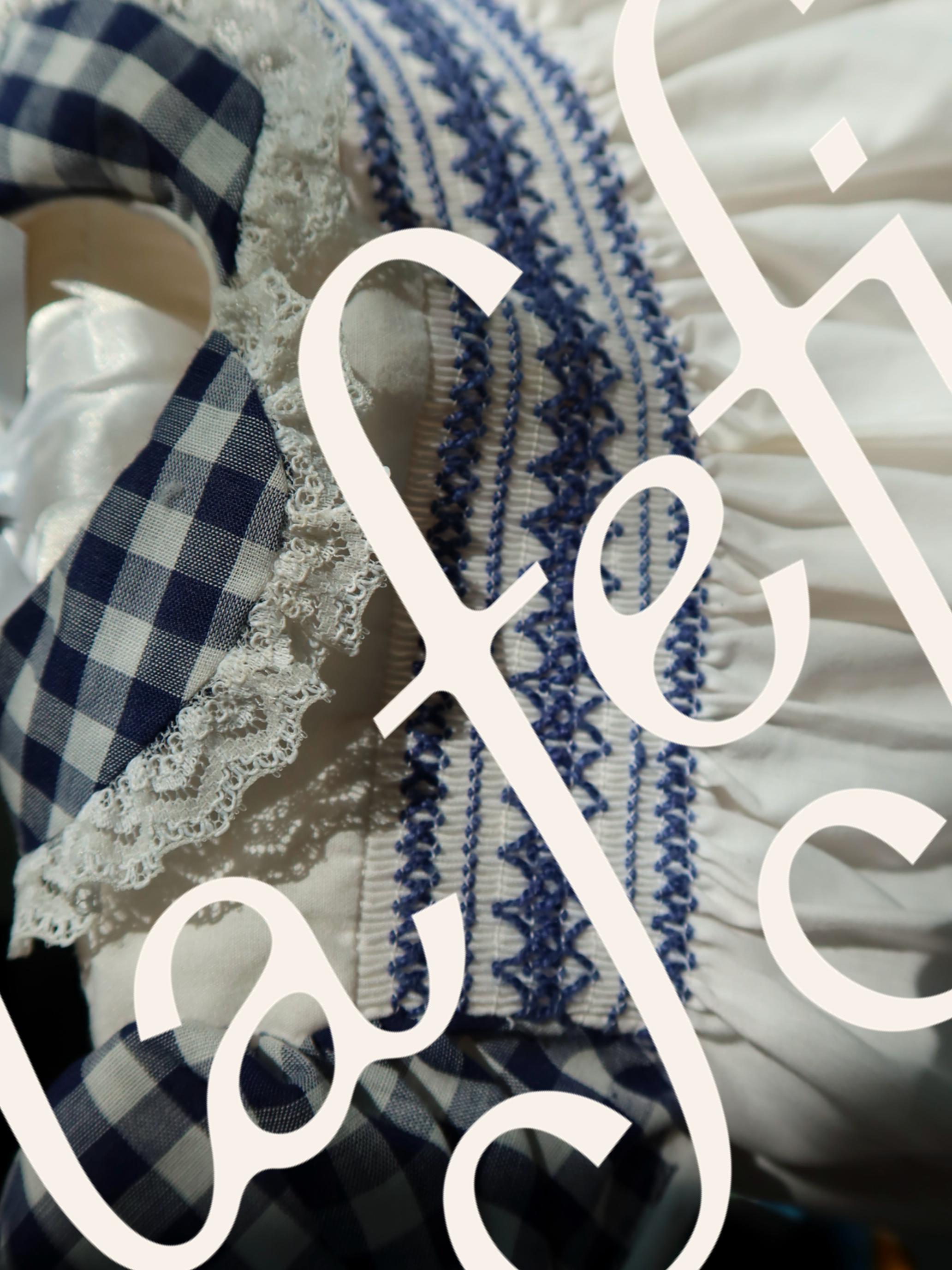 Text overlay on blue and white fabric with checkered and embroidered patterns