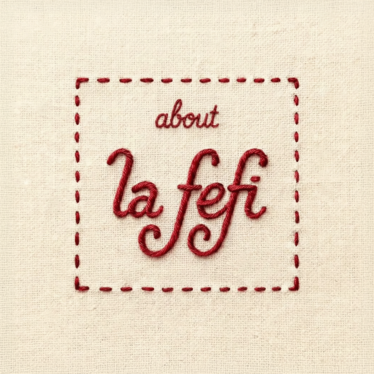 Red embroidered text that reads 'about la fefi' overlayed on beige fabric